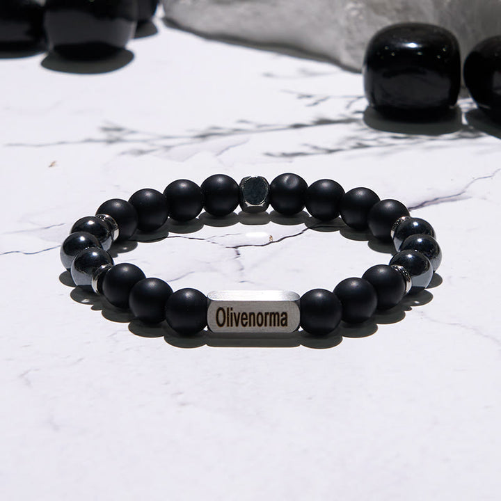 Pulsera grabada con cuentas de piedra natural de Olivenorma