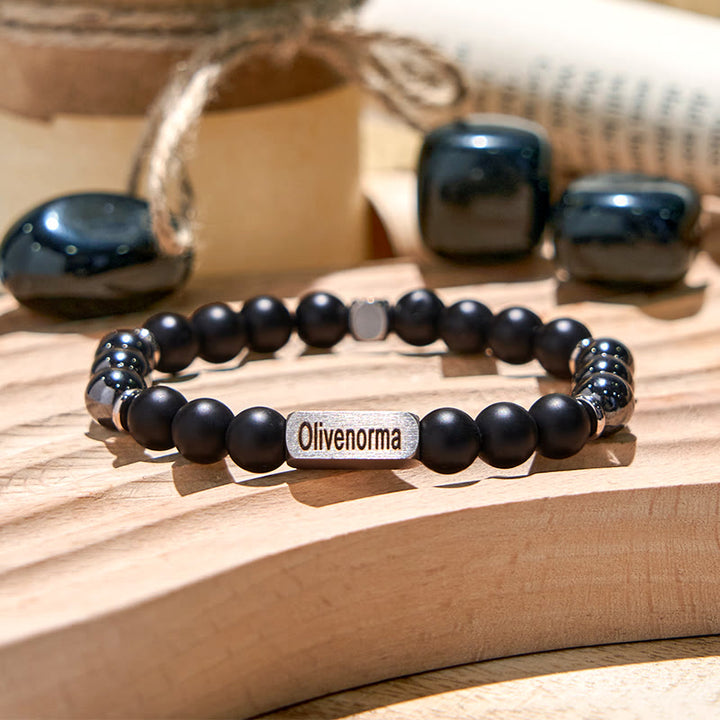 Pulsera grabada con cuentas de piedra natural de Olivenorma