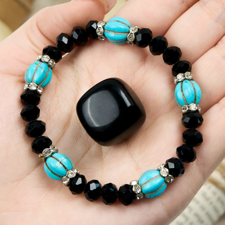 Pulsera de cuentas de obsidiana turquesa con forma de calabaza de Olivenorma