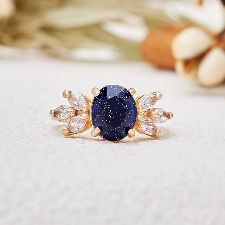Anillo de hoja de circón de piedra arenisca azul de talla ovalada de Olivenorma