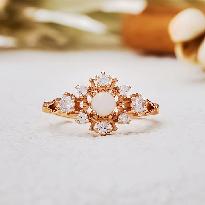 Anillo de ópalo blanco y circonita natural "Copo de nieve" de Olivenorma