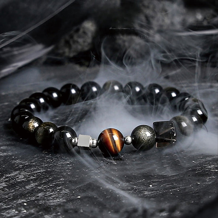 Pulsera de cuentas de obsidiana con sol intenso y luna oscura de Olivenorma