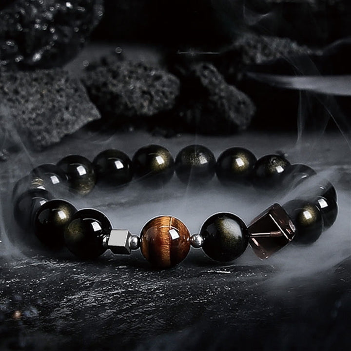 Pulsera de cuentas de obsidiana con sol intenso y luna oscura de Olivenorma