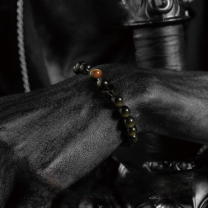 Pulsera de cuentas de obsidiana con sol intenso y luna oscura de Olivenorma