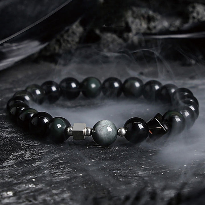 Pulsera de cuentas de obsidiana con sol intenso y luna oscura de Olivenorma