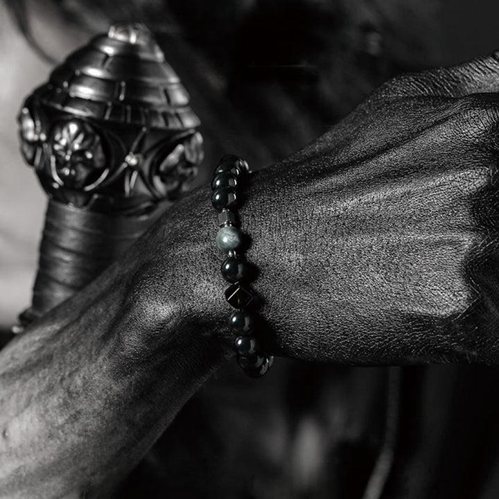 Pulsera de cuentas de obsidiana con sol intenso y luna oscura de Olivenorma