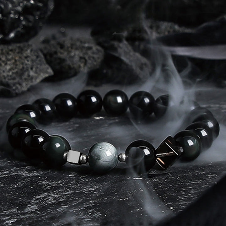 Pulsera de cuentas de obsidiana con sol intenso y luna oscura de Olivenorma
