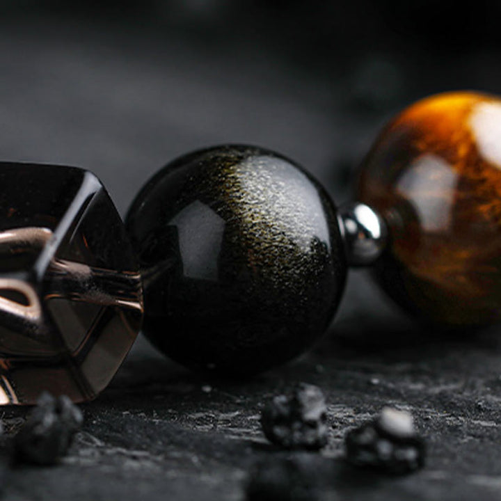 Pulsera de cuentas de obsidiana con sol intenso y luna oscura de Olivenorma