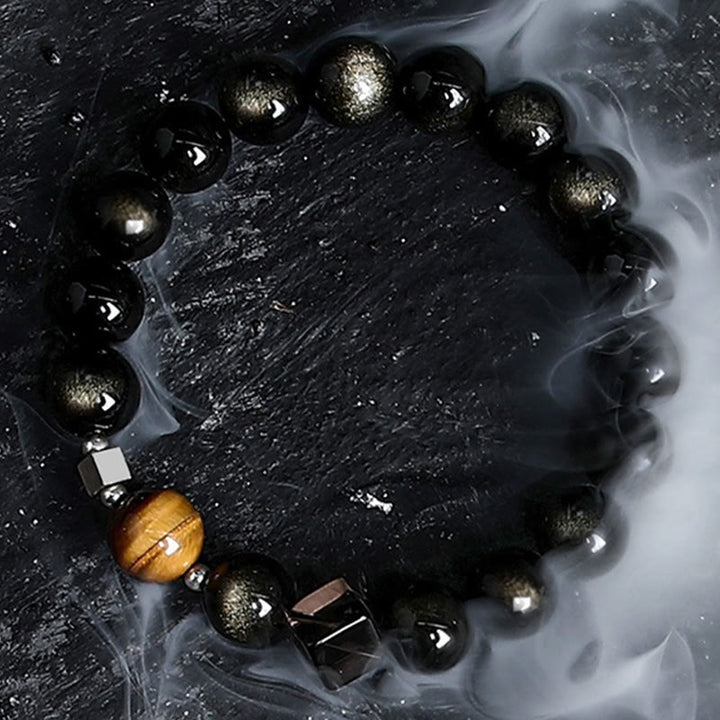 Pulsera de cuentas de obsidiana con sol intenso y luna oscura de Olivenorma