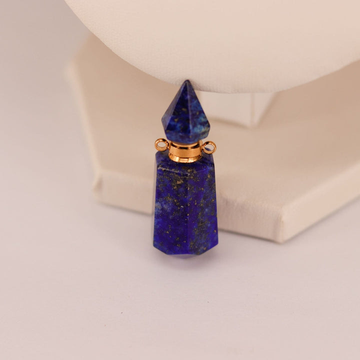 Collar con difusor de aceites esenciales en forma de botella con forma de columna hexagonal de Olivenorma