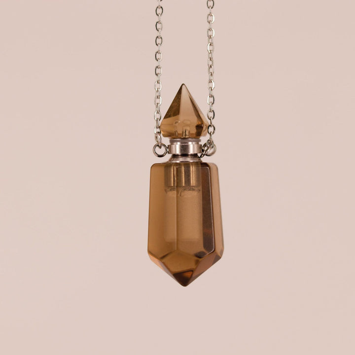 Collar con difusor de aceites esenciales en forma de botella con forma de columna hexagonal de Olivenorma