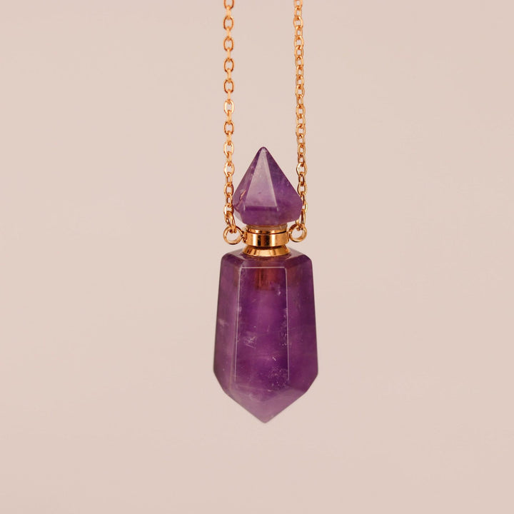 Collar con difusor de aceites esenciales en forma de botella con forma de columna hexagonal de Olivenorma