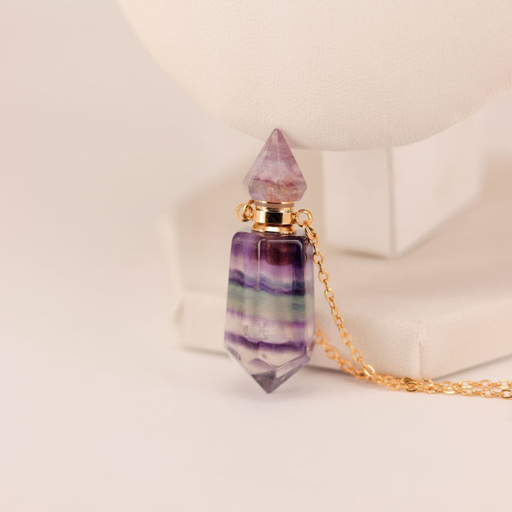 Collar con difusor de aceites esenciales en forma de botella con forma de columna hexagonal de Olivenorma