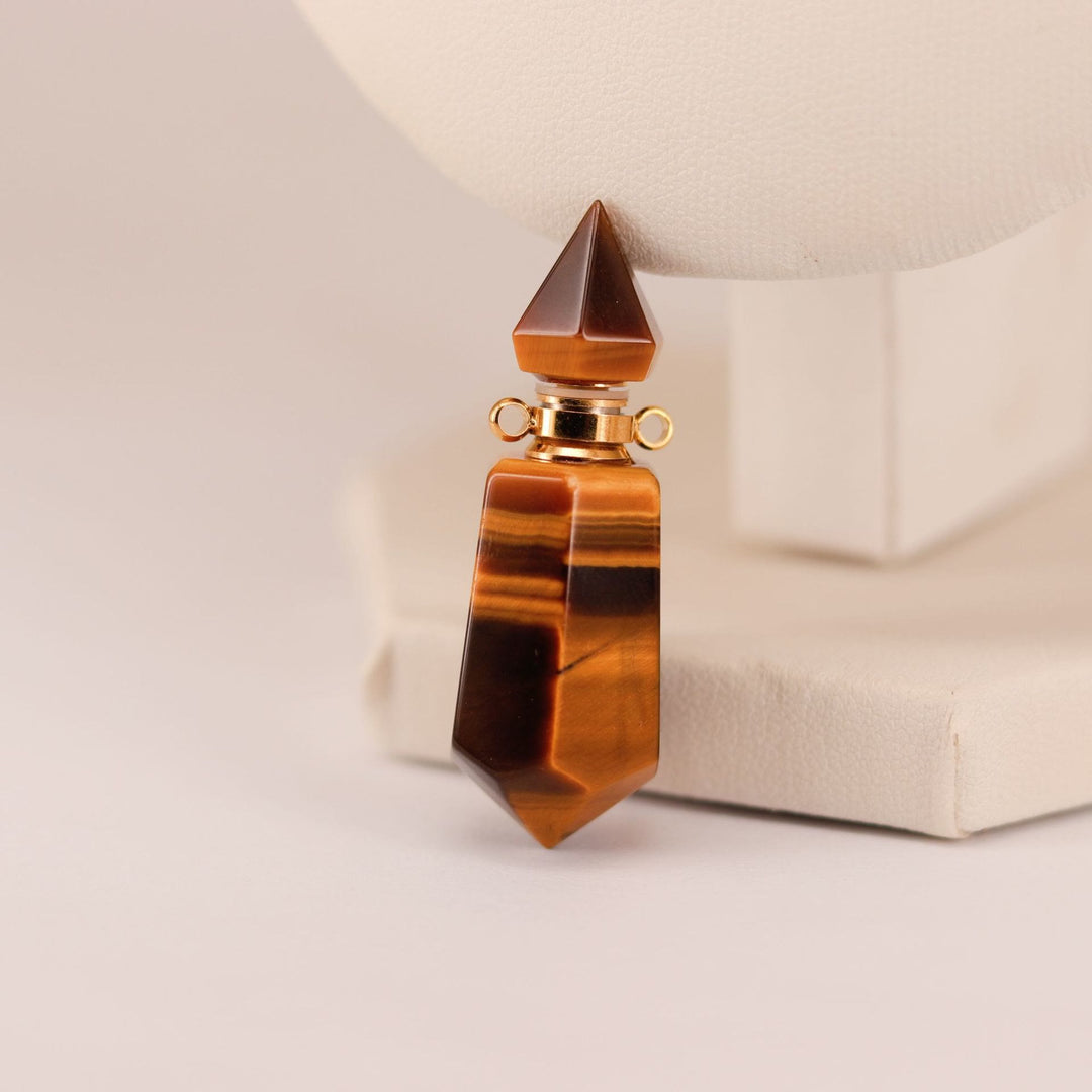 Collar con difusor de aceites esenciales en forma de botella con forma de columna hexagonal de Olivenorma