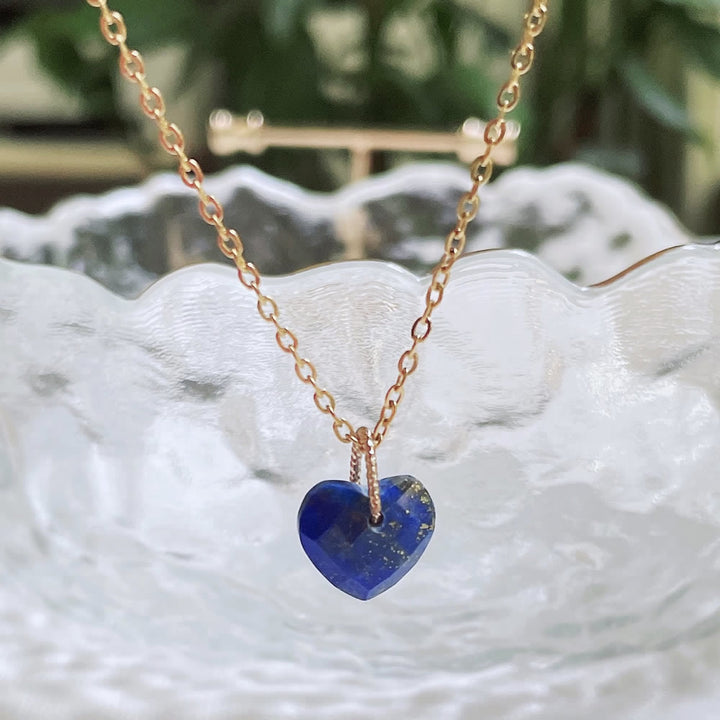 Collar de acero y titanio con corte de corazón de cristal natural de Olivenorma