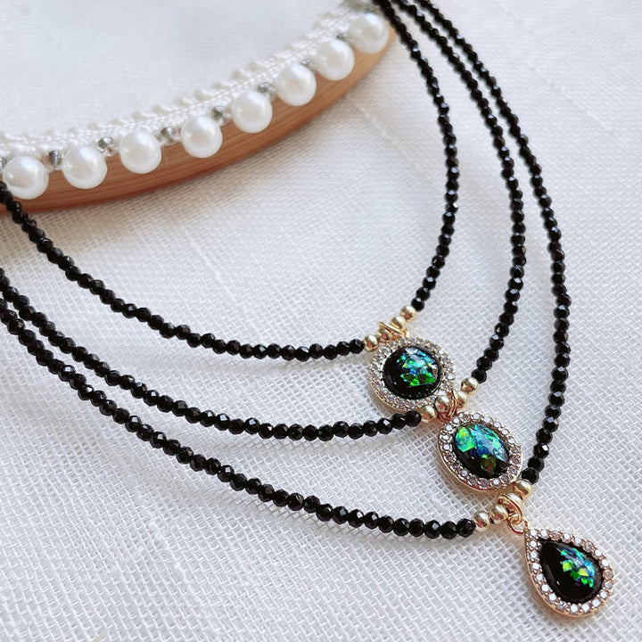 Collar con colgante de ópalo verde Olivenorma y cuentas de obsidiana