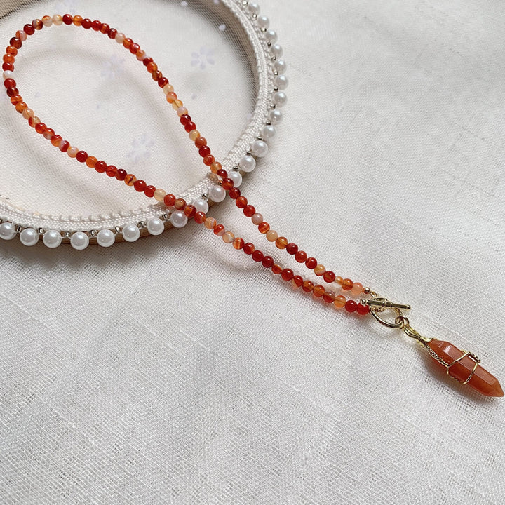 Collar de cuentas de piedra natural con colgante de columna hexagonal de Olivenorma