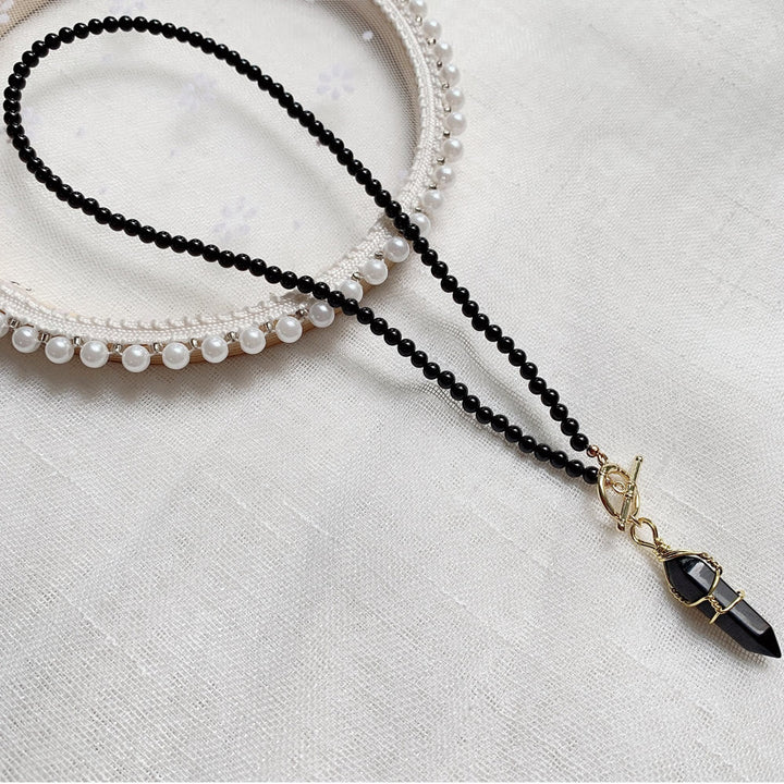 Collar de cuentas de piedra natural con colgante de columna hexagonal de Olivenorma
