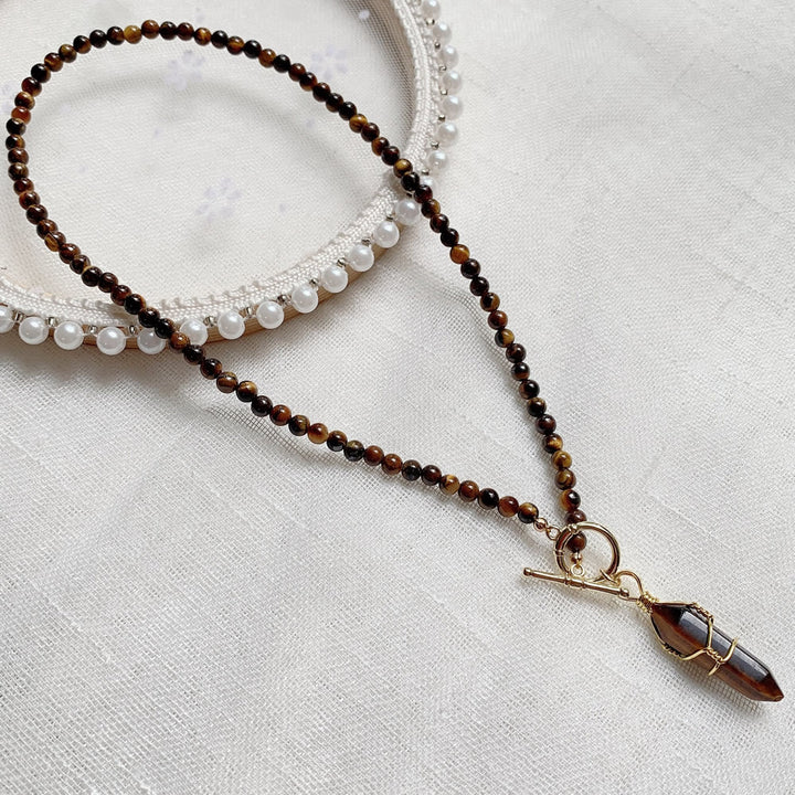 Collar de cuentas de piedra natural con colgante de columna hexagonal de Olivenorma