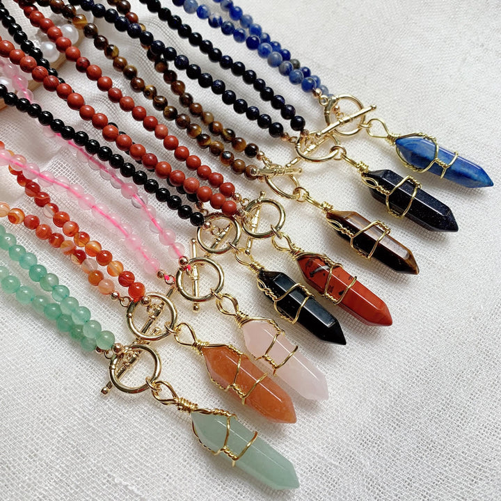 Collar de cuentas de piedra natural con colgante de columna hexagonal de Olivenorma