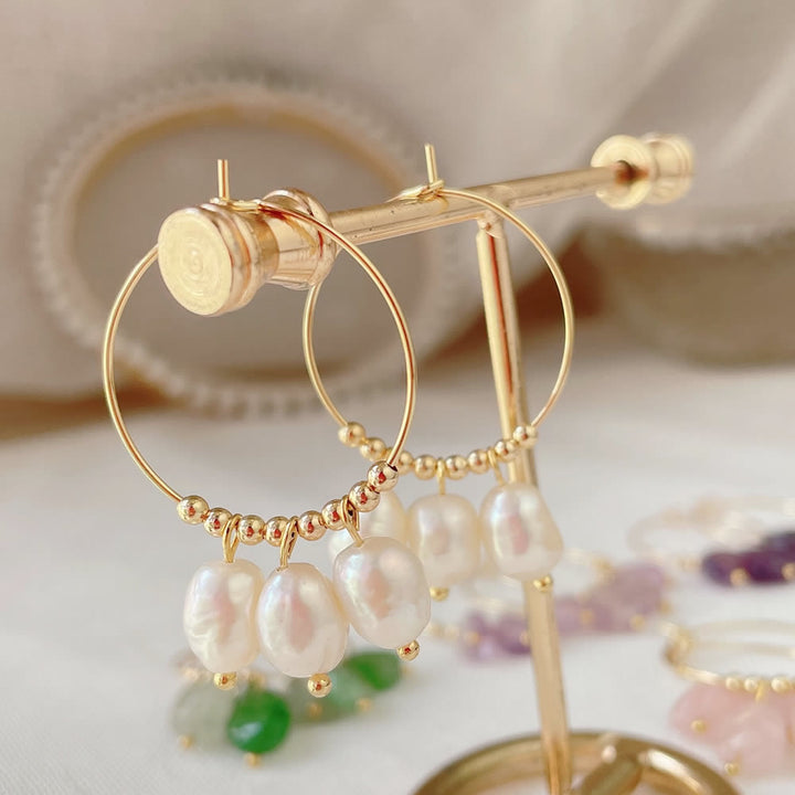 Pendientes de acero y titanio con colgante de cristal triturado natural de Olivenorma