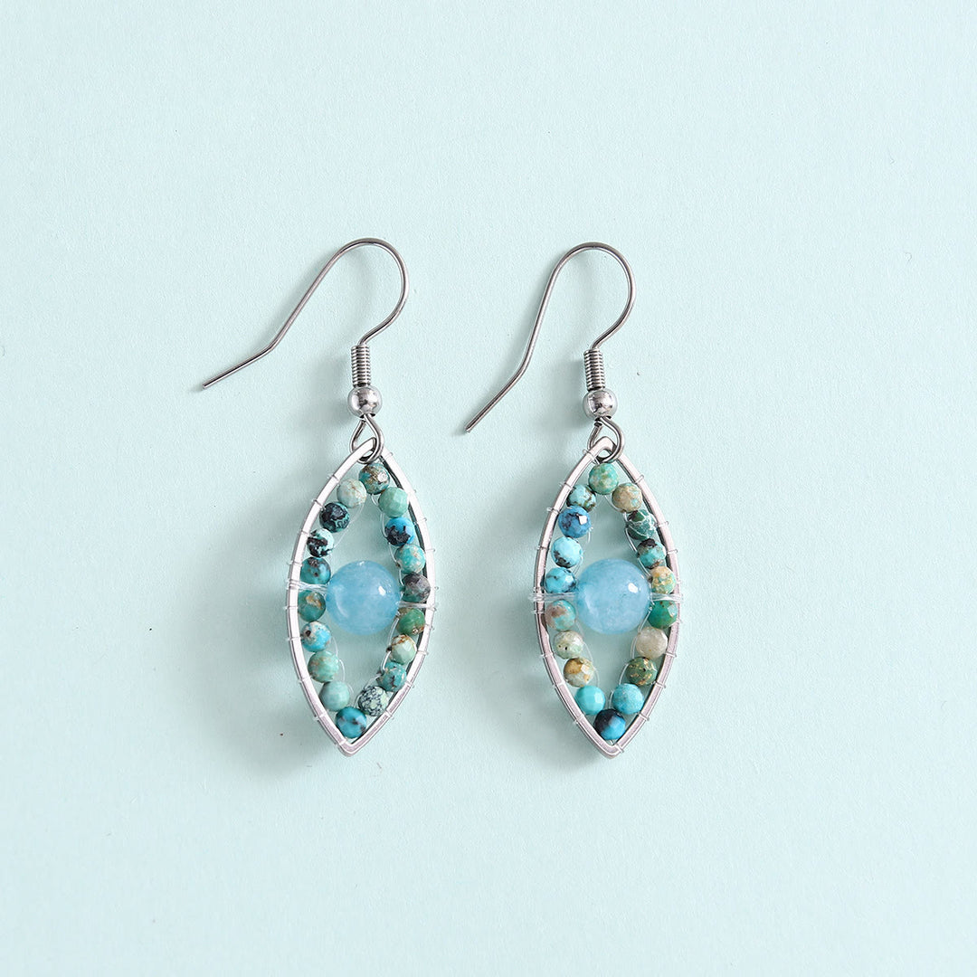 Pendientes colgantes de ojo malvado con turquesa africana y aguamarina de Olivenorma