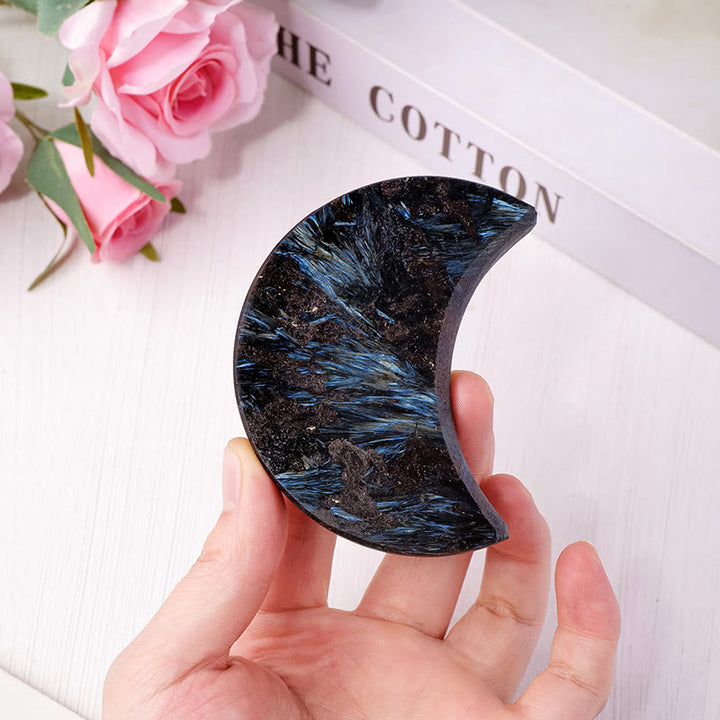 Piedra pulida de arfvedsonita Olivenorma con corte lunar, decoración