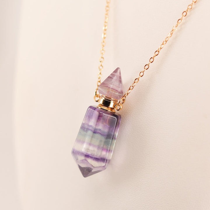 Collar con difusor de aceites esenciales en forma de botella con forma de columna hexagonal de Olivenorma