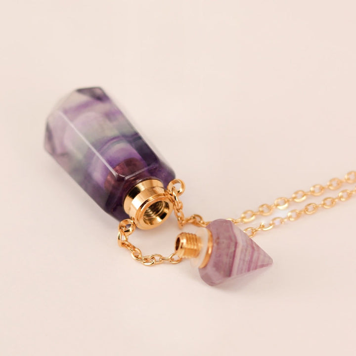 Collar con difusor de aceites esenciales en forma de botella con forma de columna hexagonal de Olivenorma