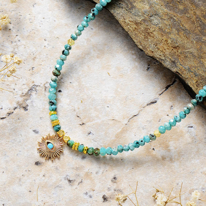 Collar con colgante de turquesa y cuentas de piedra del emperador Olivenorma