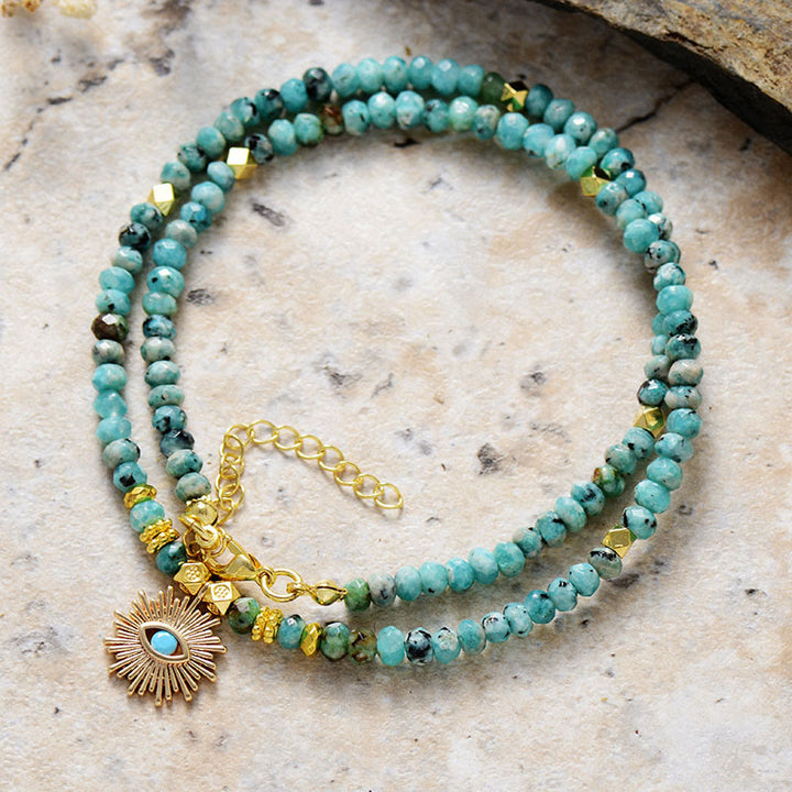 Collar con colgante de turquesa y cuentas de piedra del emperador Olivenorma