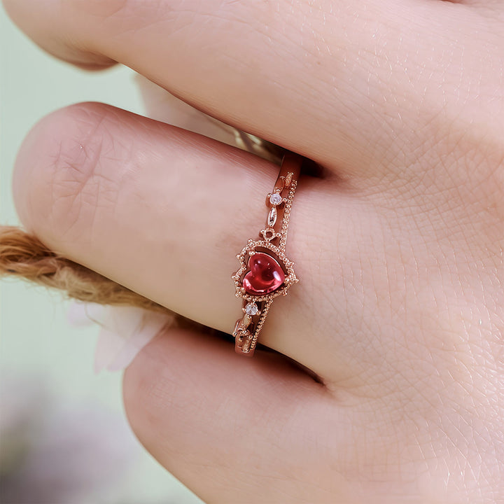 Anillo de corona de princesa con granate en forma de corazón de Olivenorma