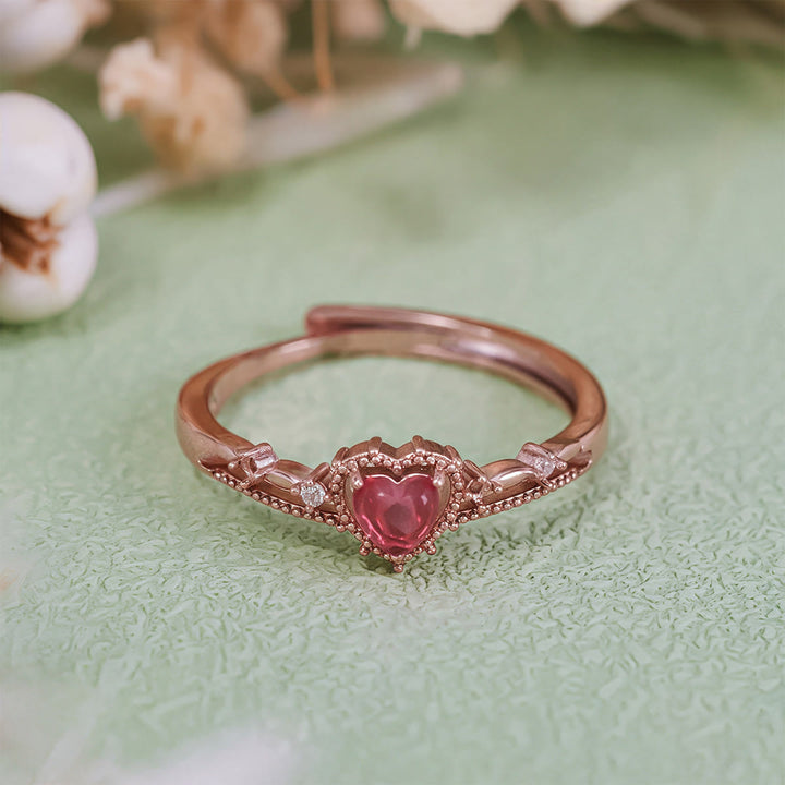Anillo de corona de princesa con granate en forma de corazón de Olivenorma