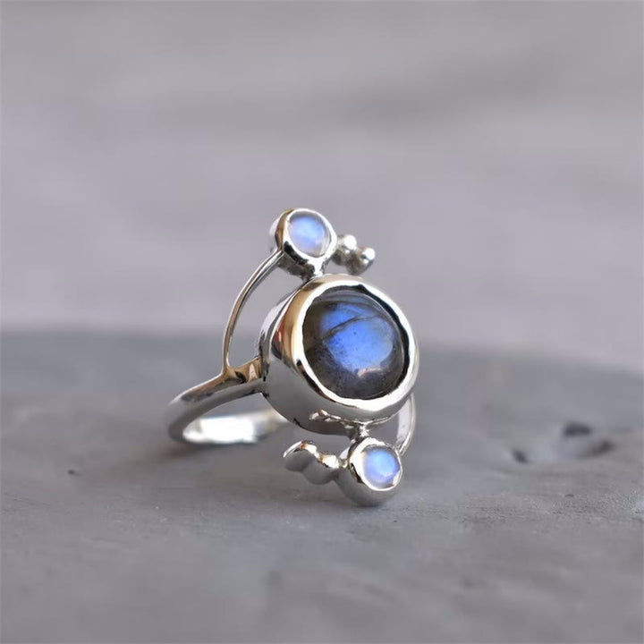 Anillo de aleación con diseño de satélite envolvente de labradorita natural de Olivenorma