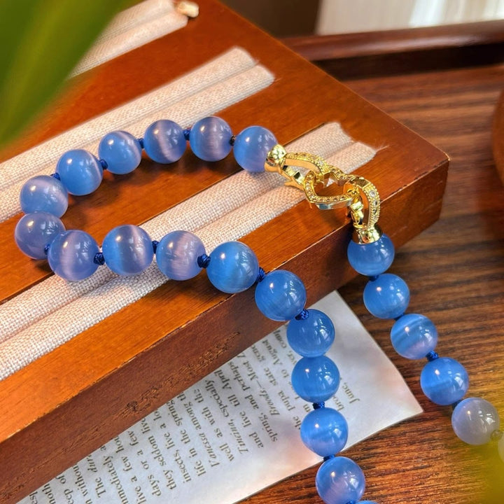 Collar de cuentas de piedra ojo de gato azul Olivenorma