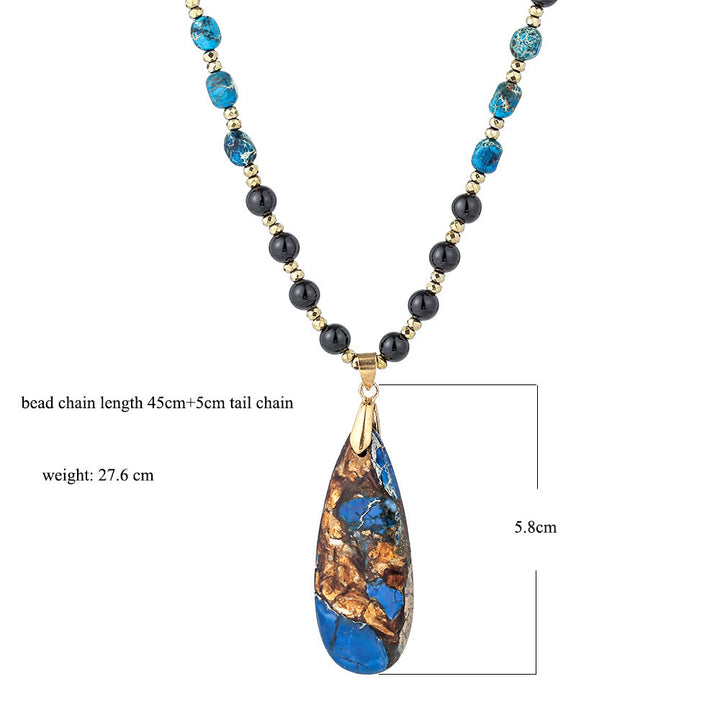 Collar con colgante de piedra emperador azul con cuentas de obsidiana de Olivenorma