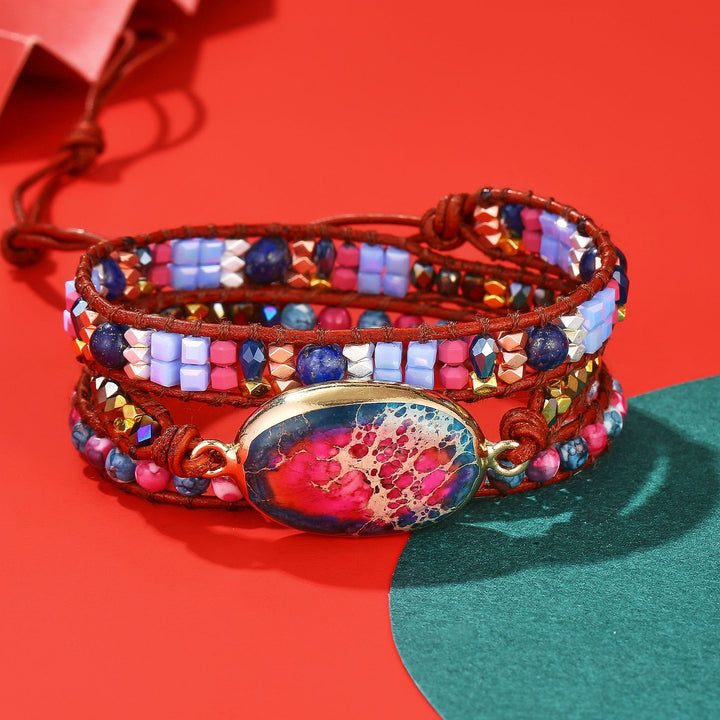 Pulsera trenzada con piedra emperador azul y roja de Olivenorma