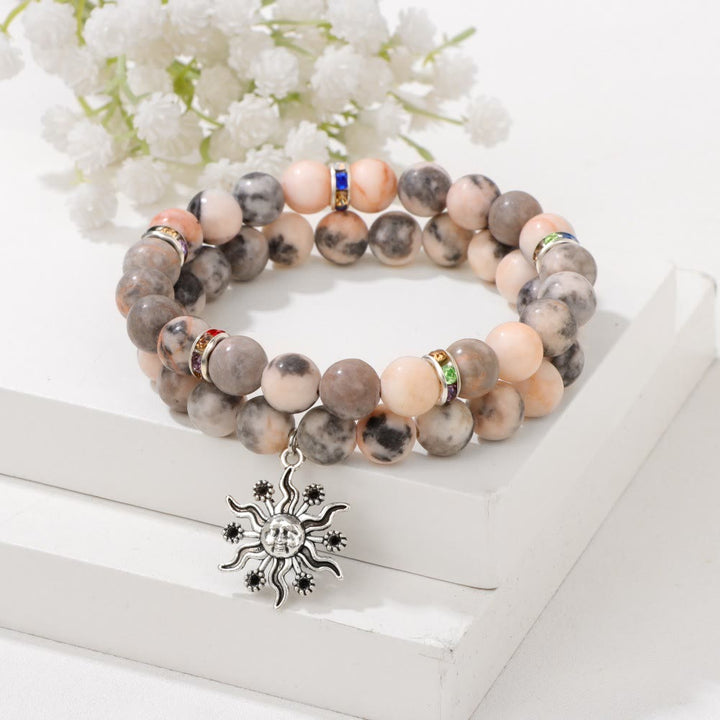 Conjunto de pulsera con colgante de sol de metal y cuentas de piedra natural de Olivenorma