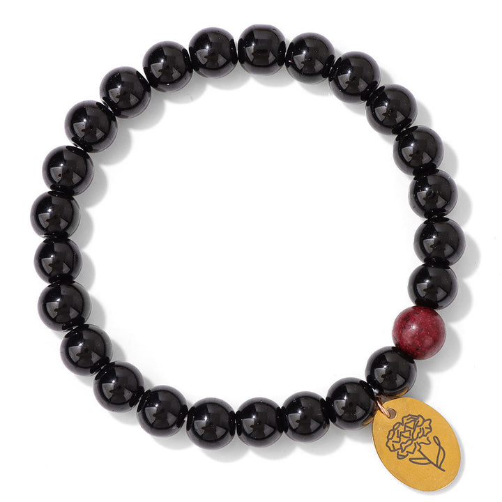 Pulsera Olivenorma de metal con cuentas de obsidiana de 8 mm y flor de nacimiento