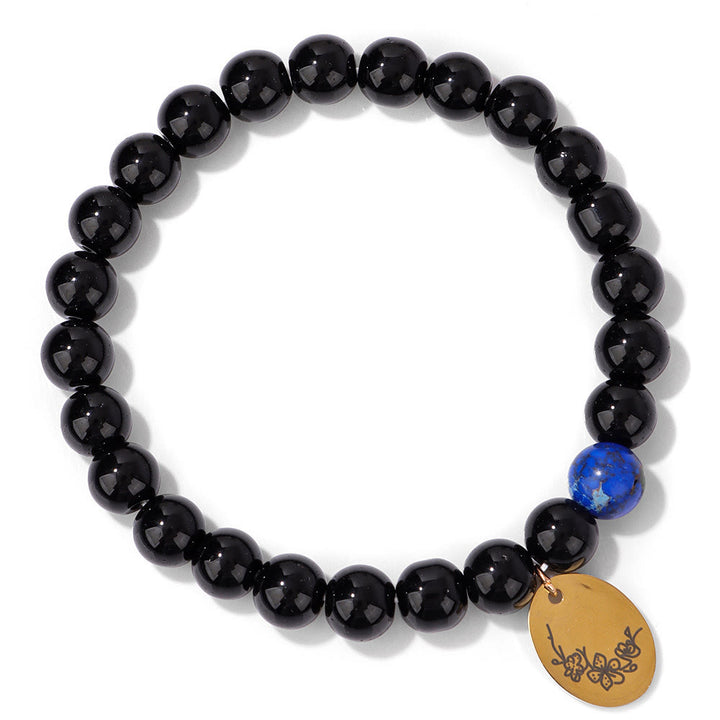 Pulsera Olivenorma de metal con cuentas de obsidiana de 8 mm y flor de nacimiento