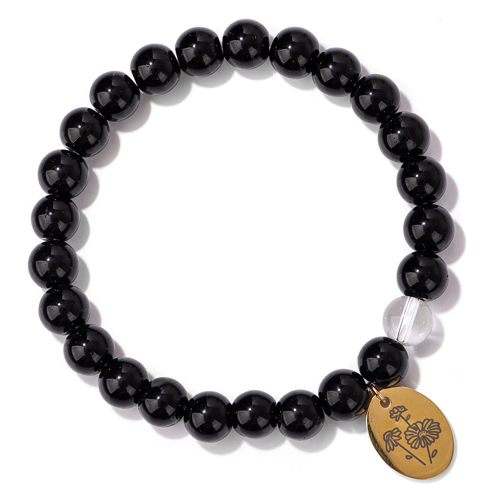 Pulsera Olivenorma de metal con cuentas de obsidiana de 8 mm y flor de nacimiento