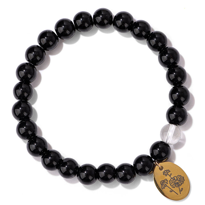 Pulsera Olivenorma de metal con cuentas de obsidiana de 8 mm y flor de nacimiento