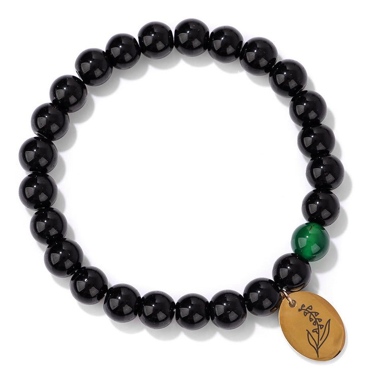Pulsera Olivenorma de metal con cuentas de obsidiana de 8 mm y flor de nacimiento