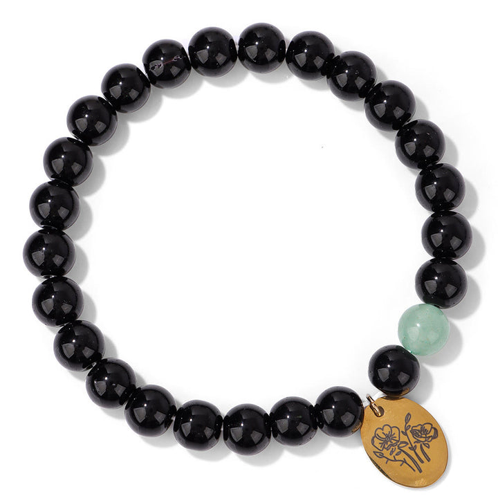 Pulsera Olivenorma de metal con cuentas de obsidiana de 8 mm y flor de nacimiento