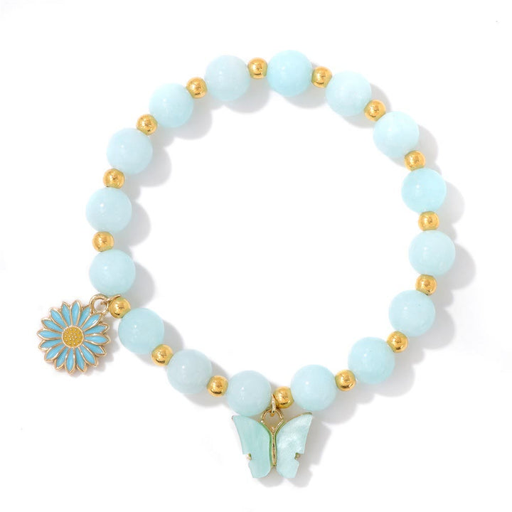Pulsera con colgante de mariposa y cuentas de cristal natural de Olivenorma