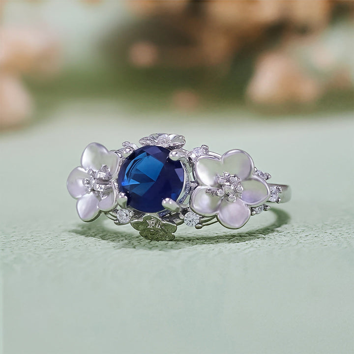 Anillo Olivenorma"Flores Florecientes" de Zafiro, Obsidiana y Circón Blanco