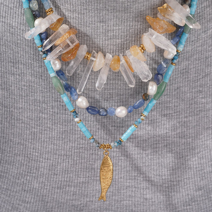 Collar con colgante de pez de acero inoxidable con cuentas de cristal de Olivenorma