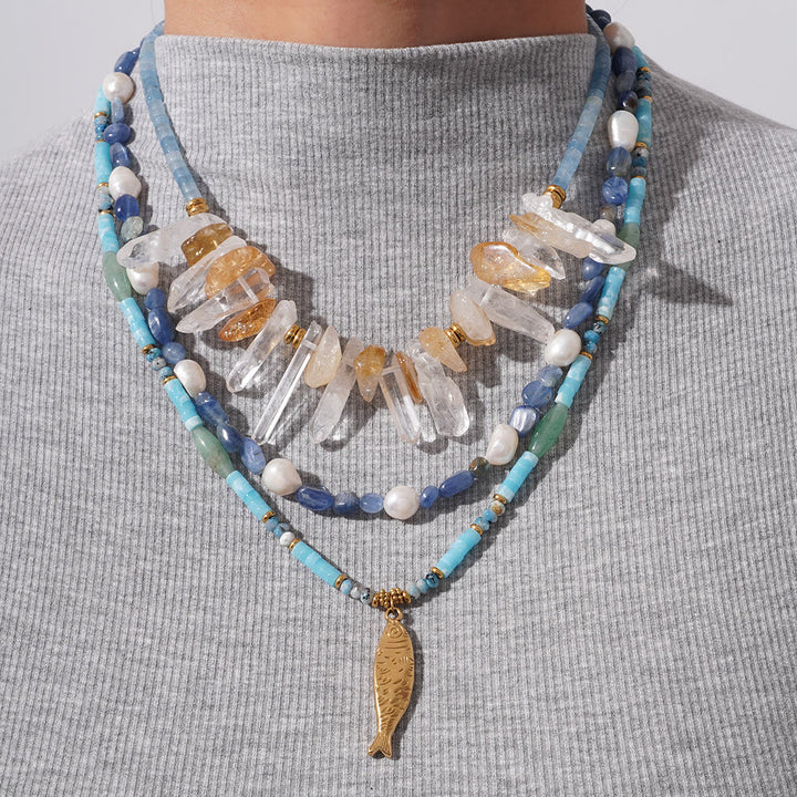 Collar con colgante de pez de acero inoxidable con cuentas de cristal de Olivenorma