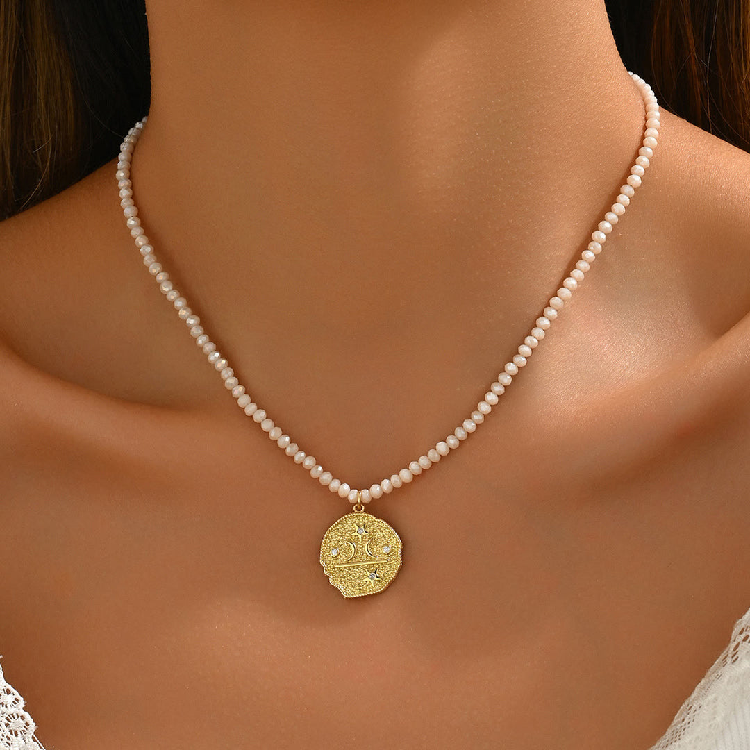 Collar con colgante de ojo malvado con cuentas de cristal natural de Olivenorma