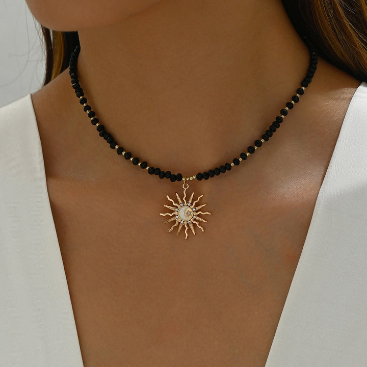 Collar con colgante de ojo malvado con cuentas de cristal natural de Olivenorma